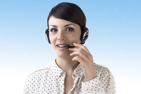 Brown-haired girl with headphones and a gradient background
