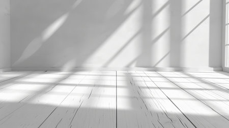 The white room interior and wood plank floor create a rhythmic shadow pattern on the wall, a perspective of minimal design architecture.の写真素材