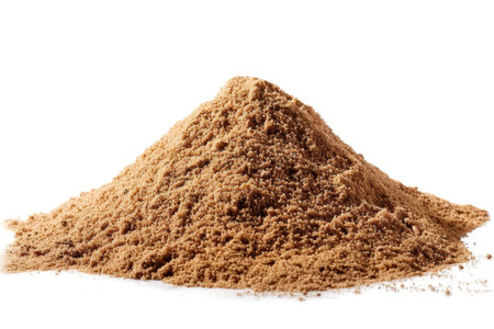 On a white background, piles of sand are isolatedの写真素材