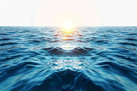 Reflection of the water on the oceans surface as the sun sets in the background.の写真素材