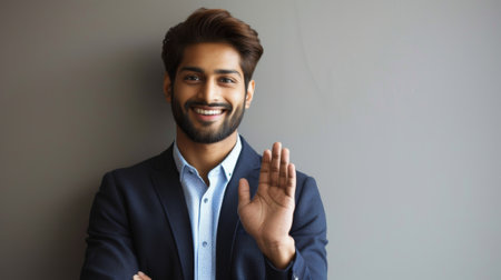Bearded indian businessman investor, rich ethnic CEO, corporate executive, attorney banker, male office employee standing isolated on gray. Portrait.の素材