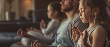During the weekend at home, a young family with little daughter practice yoga together, and happy parents rest on the sofa meditating to relieve negative emotionsの素材
