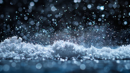 A freeze-shot of falling snow on a black background with an isolated overlay of fluffy white snowflakes. High speed shutter with real snow.の素材