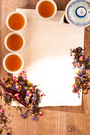 Still life of tea cups and herbsの写真素材