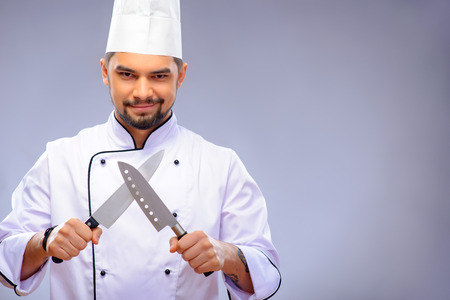 Portrait of young handsome cookの写真素材