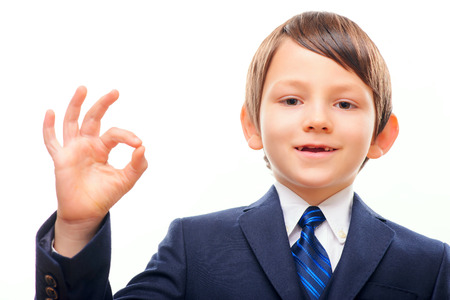 Business child in suit and tie posingの写真素材