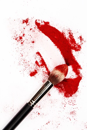 Brush and a powder spread outの写真素材