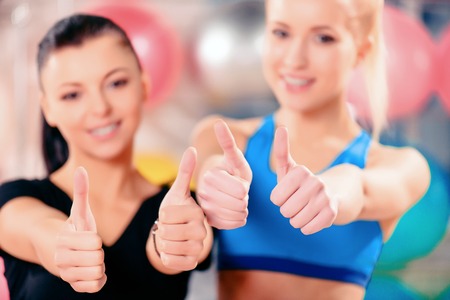 Beautiful women in sports clubの写真素材