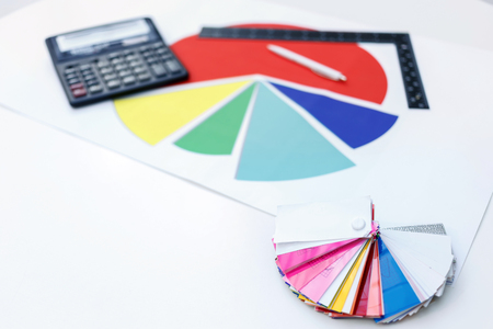Colorful utensils. Close up of table which has a lot of interesting multicolored testers and office supplies.の写真素材