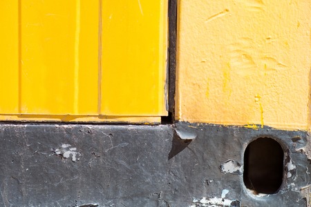 Background. A yellow and black part of something, picture may be used as a backgroundの写真素材