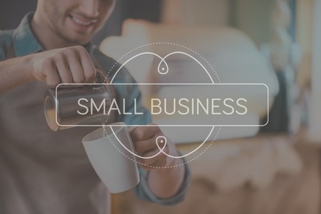 Coffee business. Cropped image of coffee being prepared by a barista with inspirational typographic quote about small business on itの写真素材