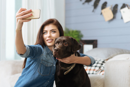 Magnetic elegant woman making a selfieの写真素材