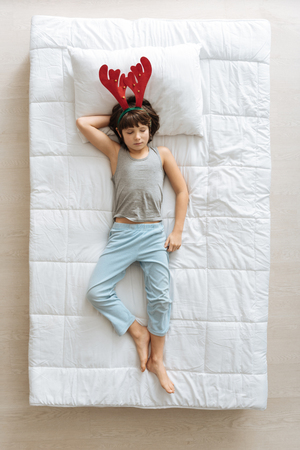 Cute funny boy feeling relaxedの写真素材
