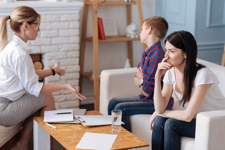 Very sad female being deep in thoughtsの写真素材