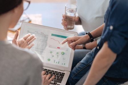 Close up of female showing diagramの写真素材