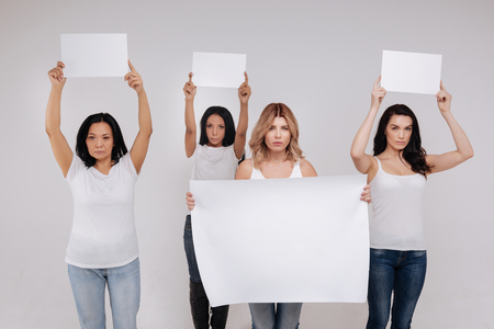 Charismatic powerful women protesting against inequalityの写真素材