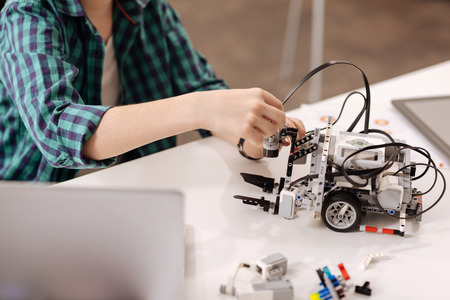 Little kid studying exact science at schoolの写真素材