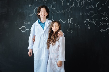 Upbeat teenagers enjoying medicine lesson at school