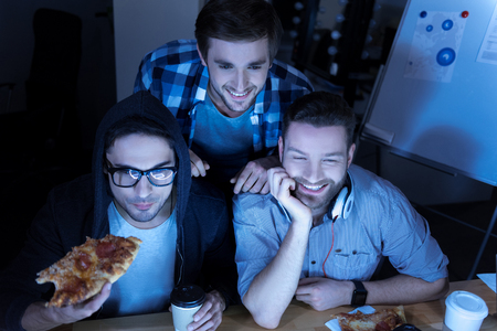 Joyful positive friends enjoying their time togetherの写真素材