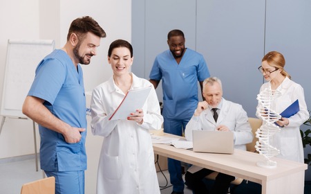 Joyful doctors enjoying science conference in the medical universityの写真素材
