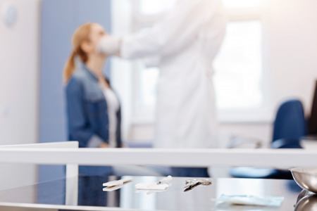 Selective focus of medical tools lying on the tableの写真素材