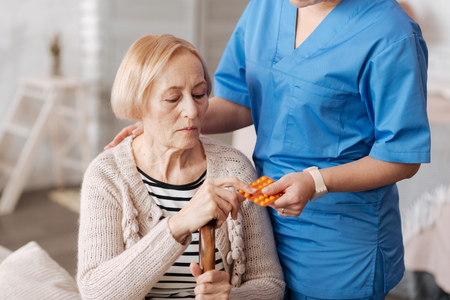 Tender fragile lady in need of medical treatmentの写真素材