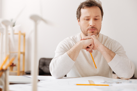Confident man thinking about his projectの写真素材