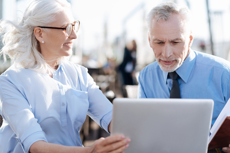 Attractive woman looking at her colleagueの写真素材
