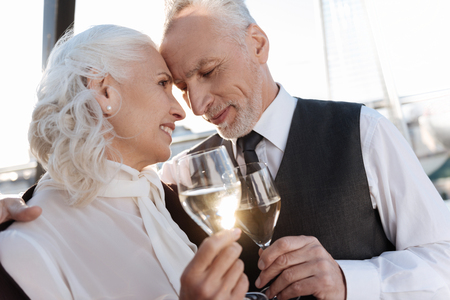 Tender man feeling happiness with this womanの写真素材