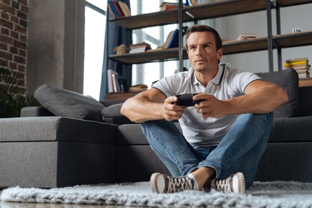 Imaginative fun guy enjoying new game