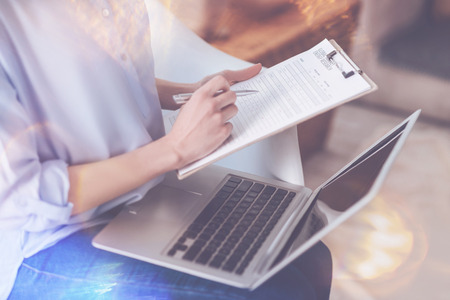 Positive woman working on the projectの写真素材