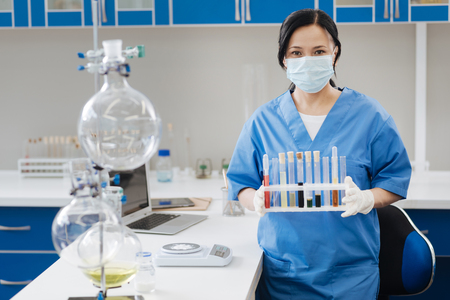 Professional lab worker looking at youの写真素材
