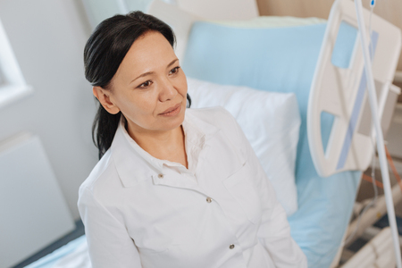 Serious smart woman working as a doctorの写真素材
