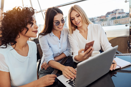 Delighted joyful women having a good timeの写真素材