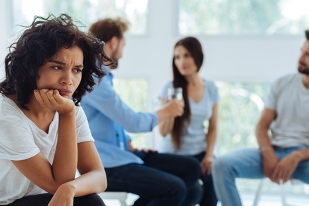 Cheerless thoughtful woman looking for a solutionの写真素材