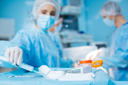 Focused photo on table being full of equipmentの写真素材