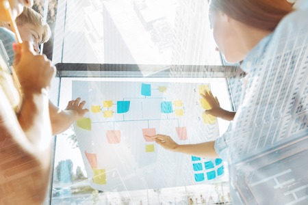 Creative coworkers discussing business plan