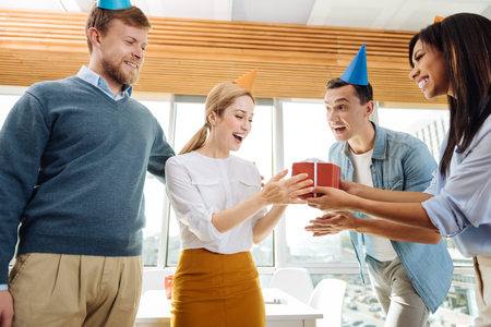 Young collective celebrating birthday partyの写真素材