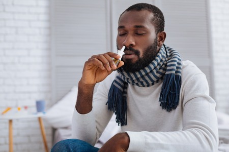 Quiet man smelling nice nasal dropsの写真素材