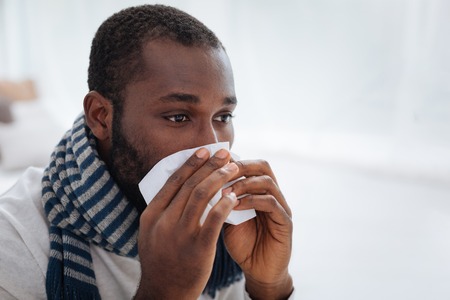 Sad portrait of an ill tired manの写真素材