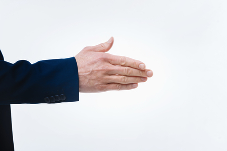 Nice to meet you. Close up of a male hand being given to you by a nice positive friendly businessman during the first meetingの写真素材