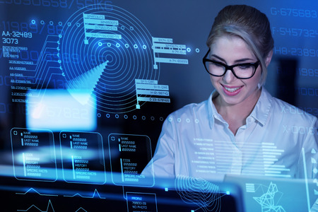 Working. Smart reliable qualified programmer dealing with important cyber security while being in...