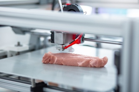 Perfect imitation. The close up of a modern 3D printer making a piece of meat and imitating all the details exactlyの写真素材