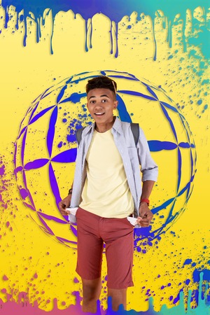 Picture with globe. Young traveler wearing shorts and striped shirt wearing blue backpack standing in front of picture with globeの写真素材