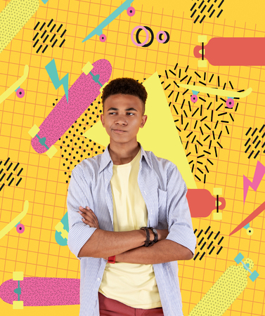 Deep thoughts. Calm thoughtful teenager frowning and having his arms crossed while dreaming about being a designerの写真素材