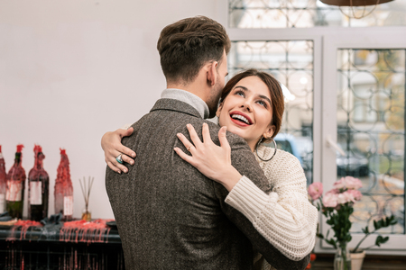 Lovely moment. A man and a woman romantically hugging each otherの写真素材
