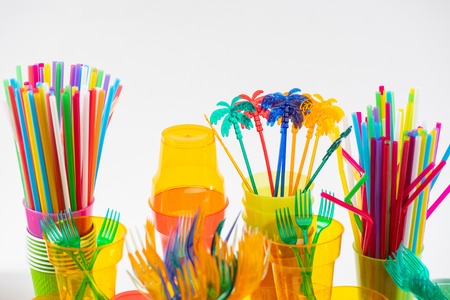 Ecology catastrophe. Colorful toxic tools and useful disposable thing displaying poor state of our nature and pollution of the planetの写真素材