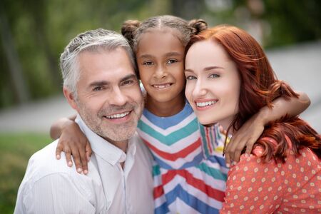 Spending time together. Happy family feeling amazing while spending time together at the weekend