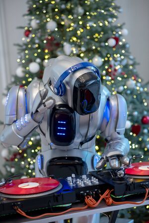 Favourite songs. Robot dj in earphones looking busy dealing with vinyls