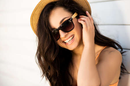 Posing. Pretty smiling brunette posing for the camera